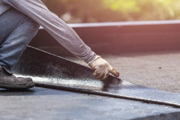 Professional Interior Drainage System technician working in Medford, NY